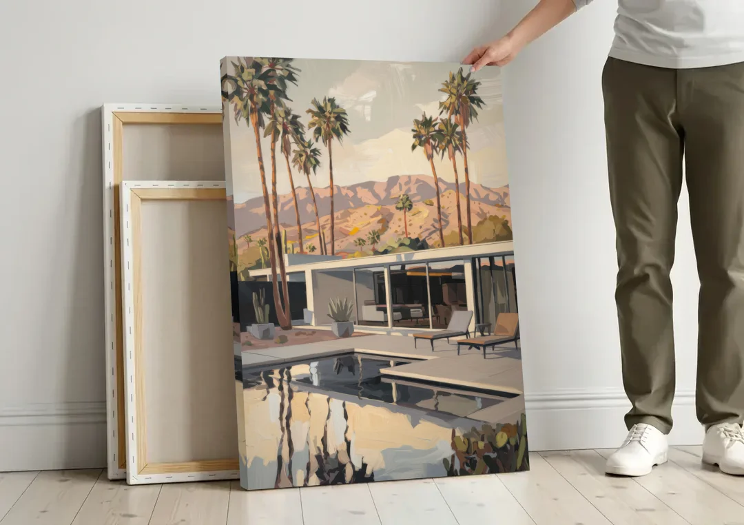 Palm Springs Mid Century Vibes canvas wall art leaning against a wall next to blank canvases