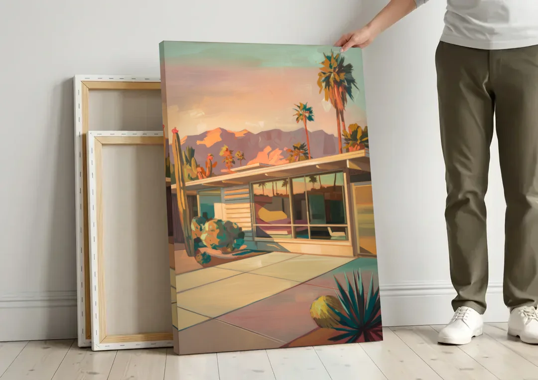 Palm Springs Retro Architecture canvas wall art leaning against a wall next to blank canvases