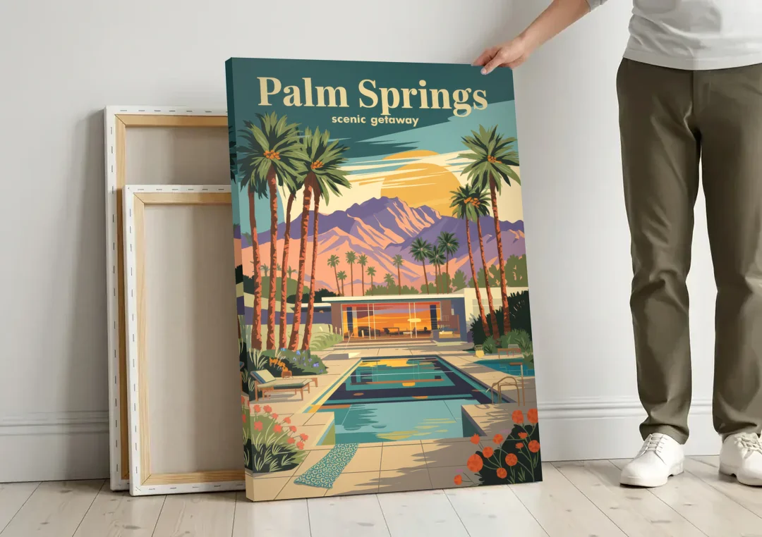 Palm Springs Scenic Getaway canvas wall art leaning against a wall next to blank canvases