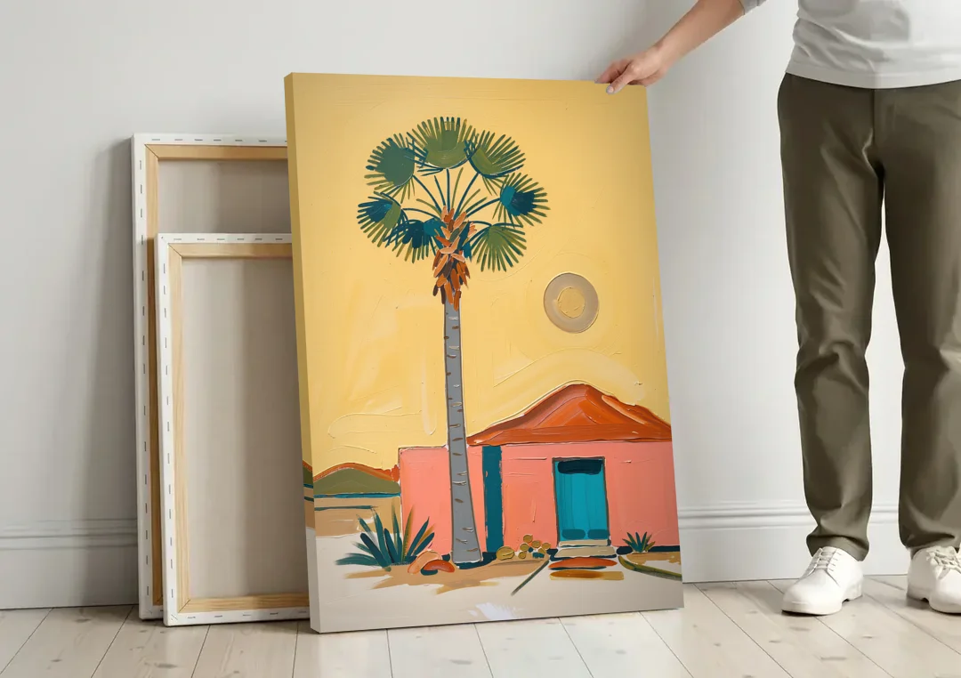 Palm Springs Wall Art with Fan Palm and Casita canvas wall art leaning against a wall next to blank canvases