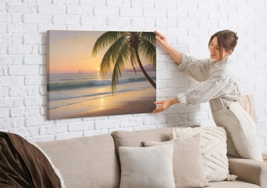 Palmilla Beach Sunrise canvas wall art being hung on a white brick wall above a sofa