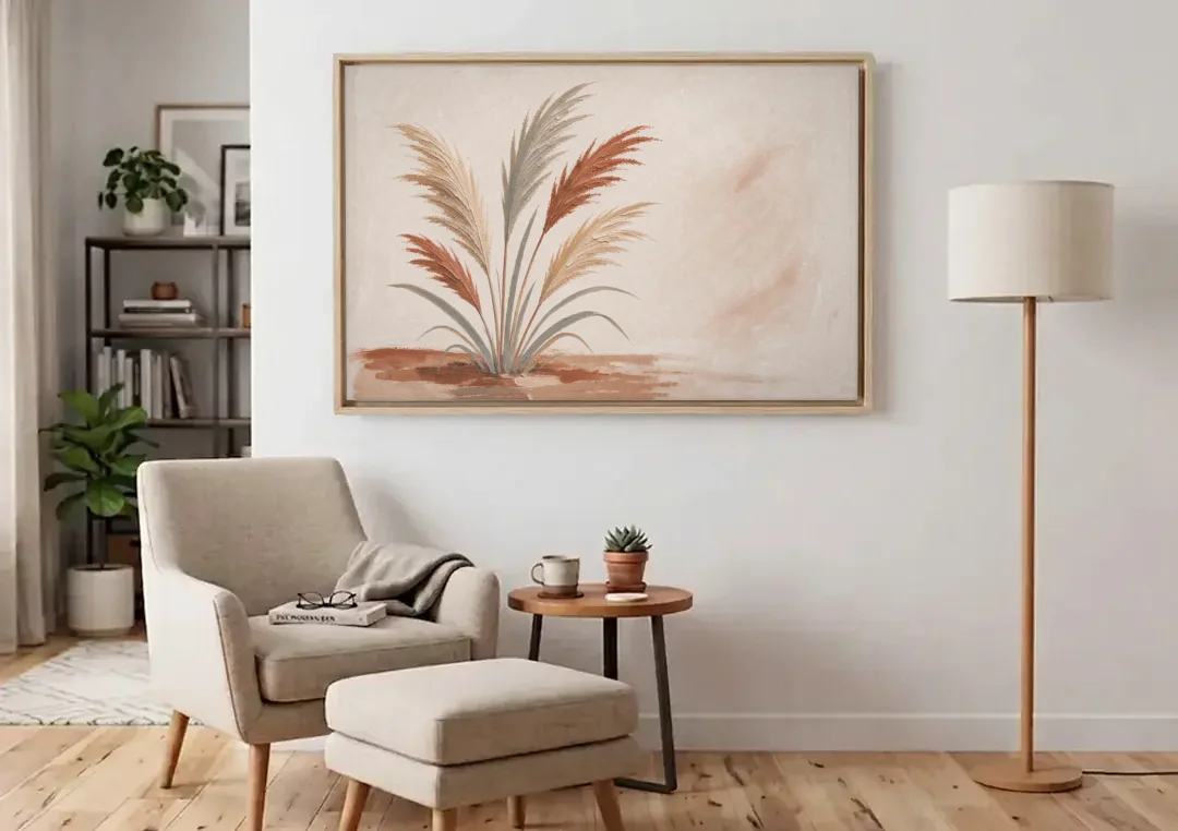 Pampas Grass Painting in a Soft Breeze canvas wall art above an armchair in a bright living room
