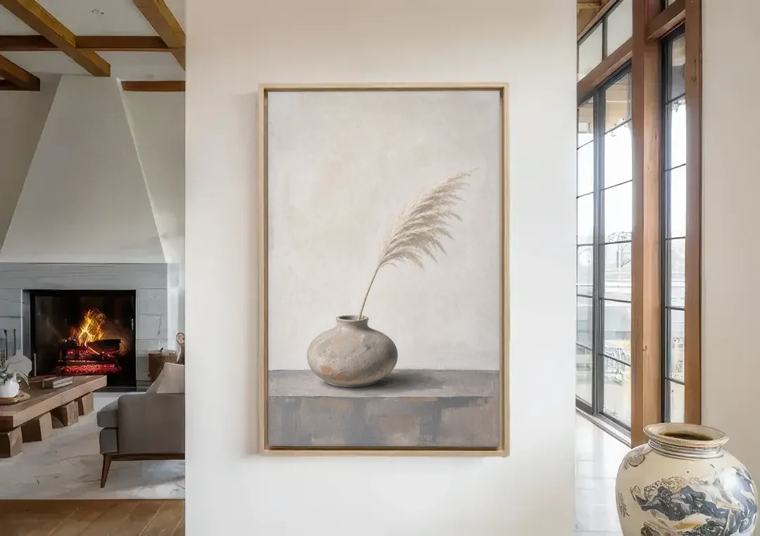 Pampas Plume in a Round Stoneware Vase canvas wall art in a living room with a fireplace