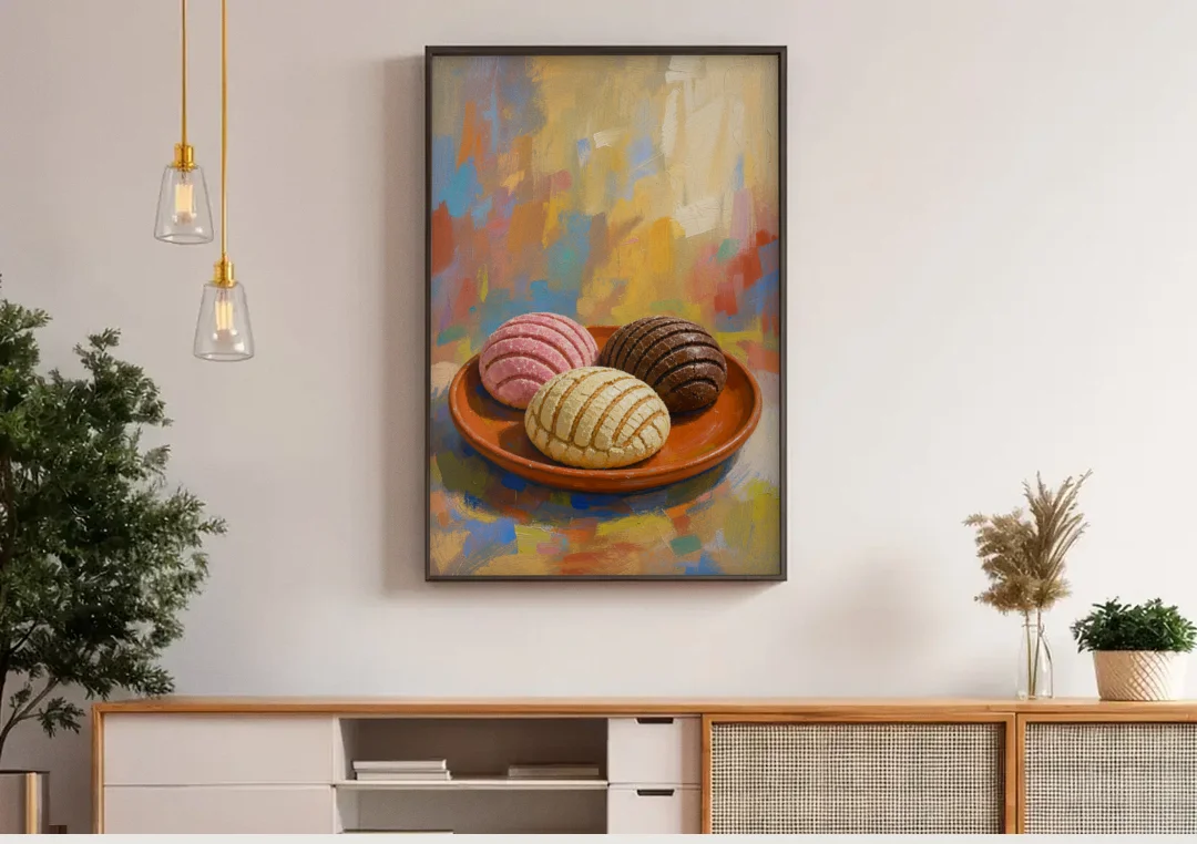 Pan Dulce Painting of Three Conchas canvas wall art above a wooden sideboard under pendant lights