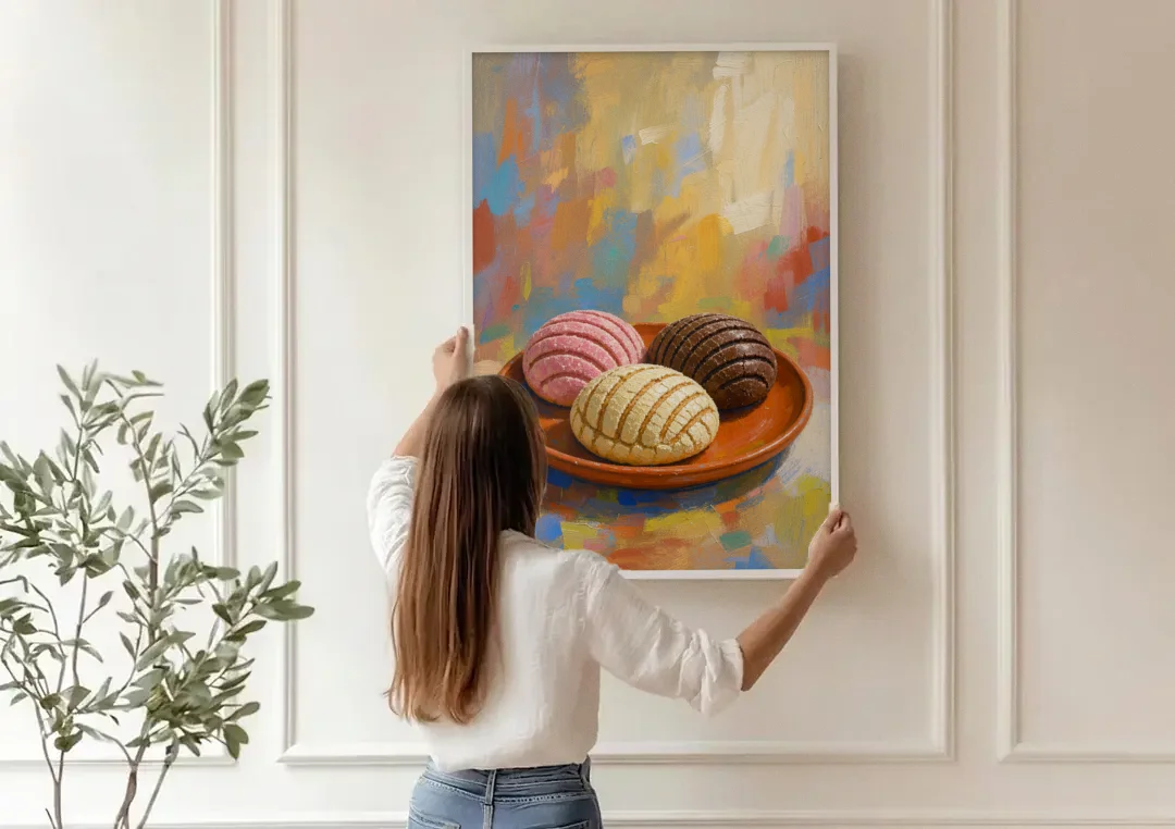 Pan Dulce Painting of Three Conchas canvas wall art being hung on a paneled wall