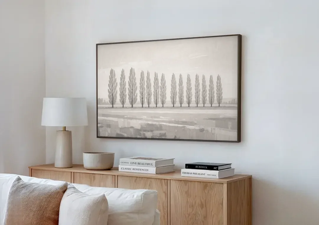 Panoramic Canvas Print of Poplars in Haze canvas wall art above a wooden sideboard next to a sofa