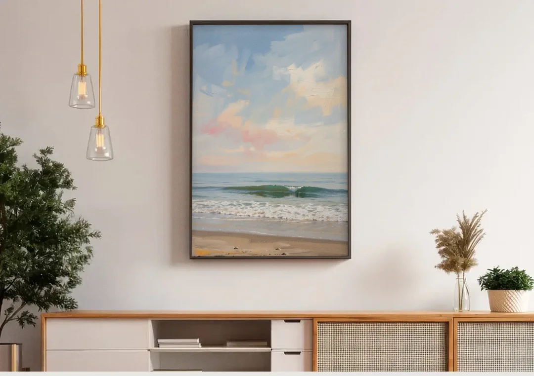 Pastel Abstract Wall Art of a Blush Morning Sea canvas wall art above a wooden sideboard under pendant lights