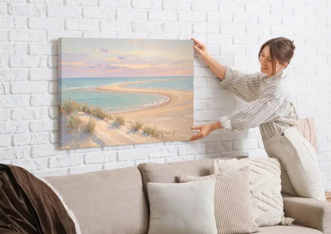 Pastel Beach Painting with Seafoam Lagoon canvas wall art being hung on a white brick wall above a sofa