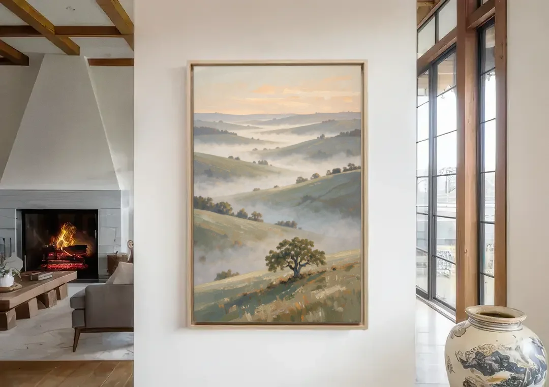 Peaceful Landscape Painting of Misty Hills and Oak canvas wall art in a living room with a fireplace