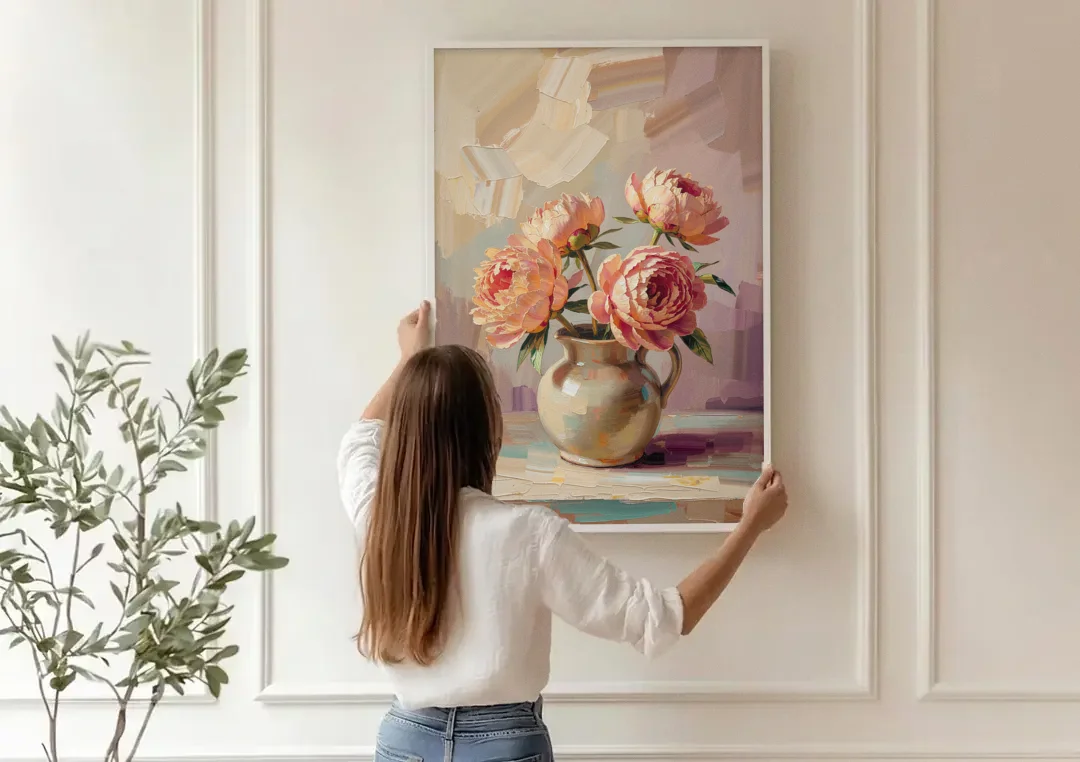 Peonies in Vase Painting in Peach Blush canvas wall art being hung on a paneled wall