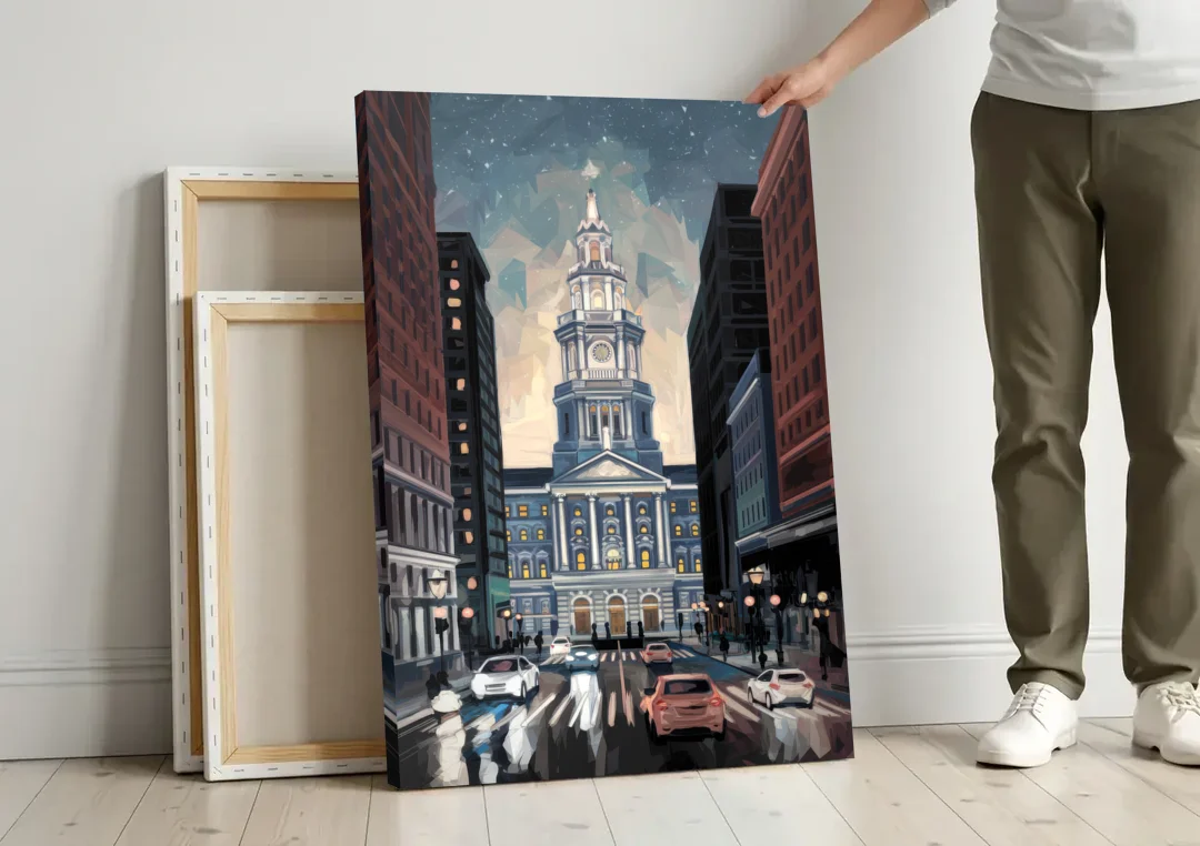 Philadelphia City Hall canvas wall art leaning against a wall next to blank canvases