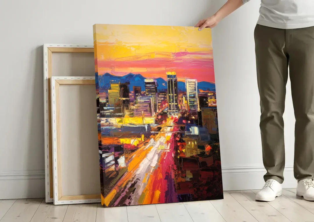 Phoenix Arizona Downtown Lights canvas wall art leaning against a wall next to blank canvases