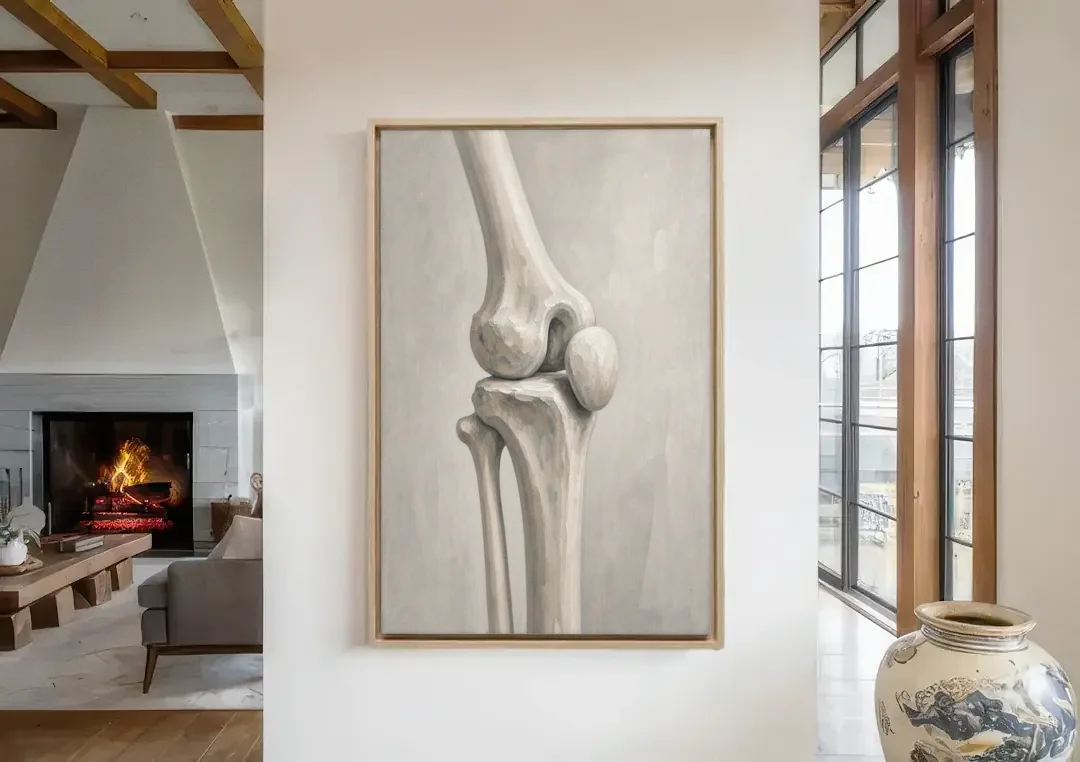 Physical Therapy Wall Art of the Knee Joint canvas wall art in a living room with a fireplace