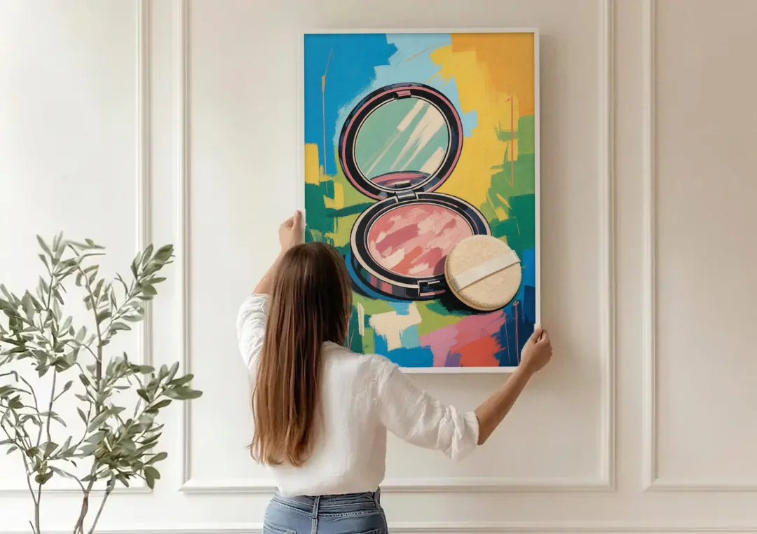Pink Bathroom Wall Art with an Open Powder Compact canvas wall art being hung on a paneled wall