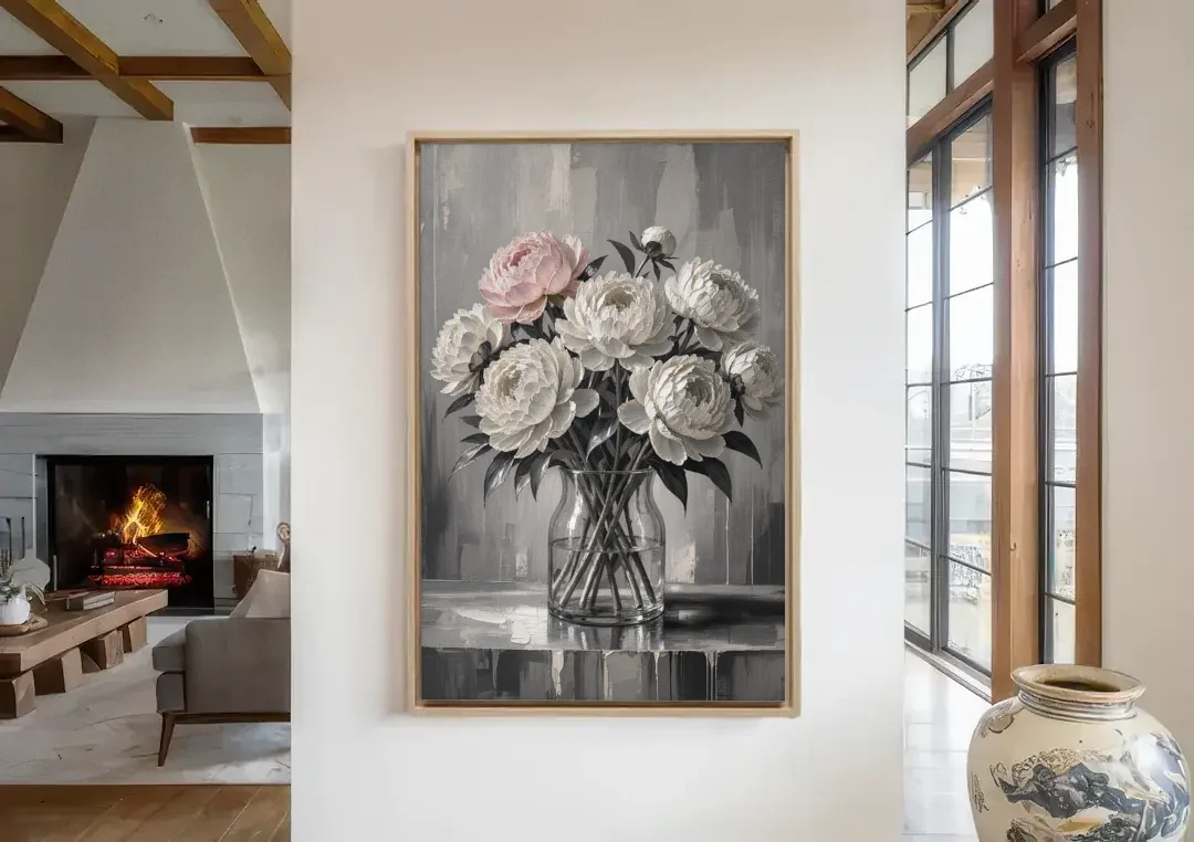 Pink Black and White Wall Art of Peonies canvas wall art in a living room with a fireplace