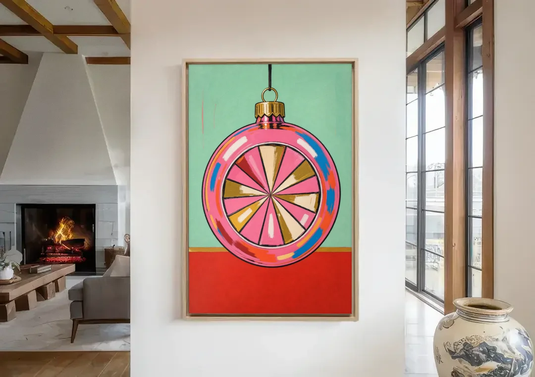 Pink Christmas Wall Art of a Glass Reflector Ornament canvas wall art in a living room with a fireplace