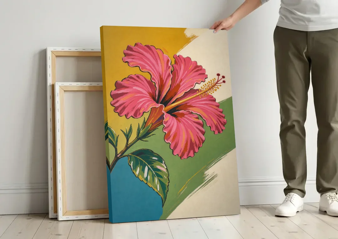 Pink Hibiscus with Long Reaching Stamen canvas wall art leaning against a wall next to blank canvases
