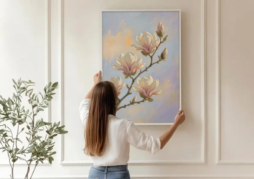 Pink Magnolia Flower Branch at Dawn canvas wall art being hung on a paneled wall