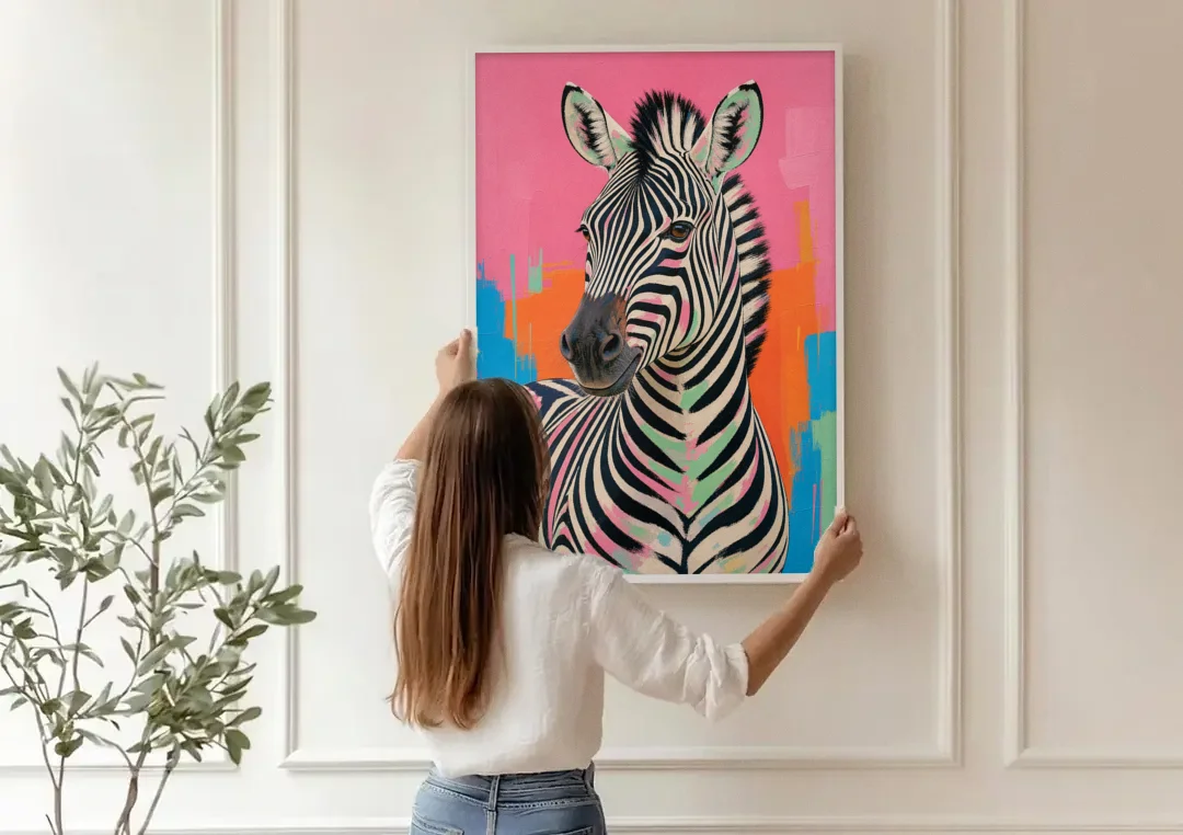 Pink Zebra Sideways Glance in Pop Art canvas wall art being hung on a paneled wall