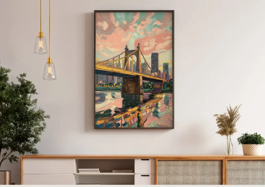 Pittsburgh Bridges and Rivers canvas wall art above a wooden sideboard under pendant lights