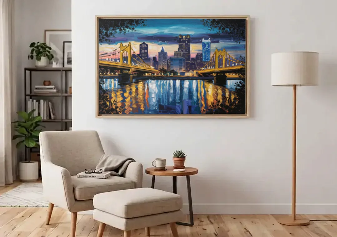 Pittsburgh Downtown Lights at Night canvas wall art above an armchair in a bright living room