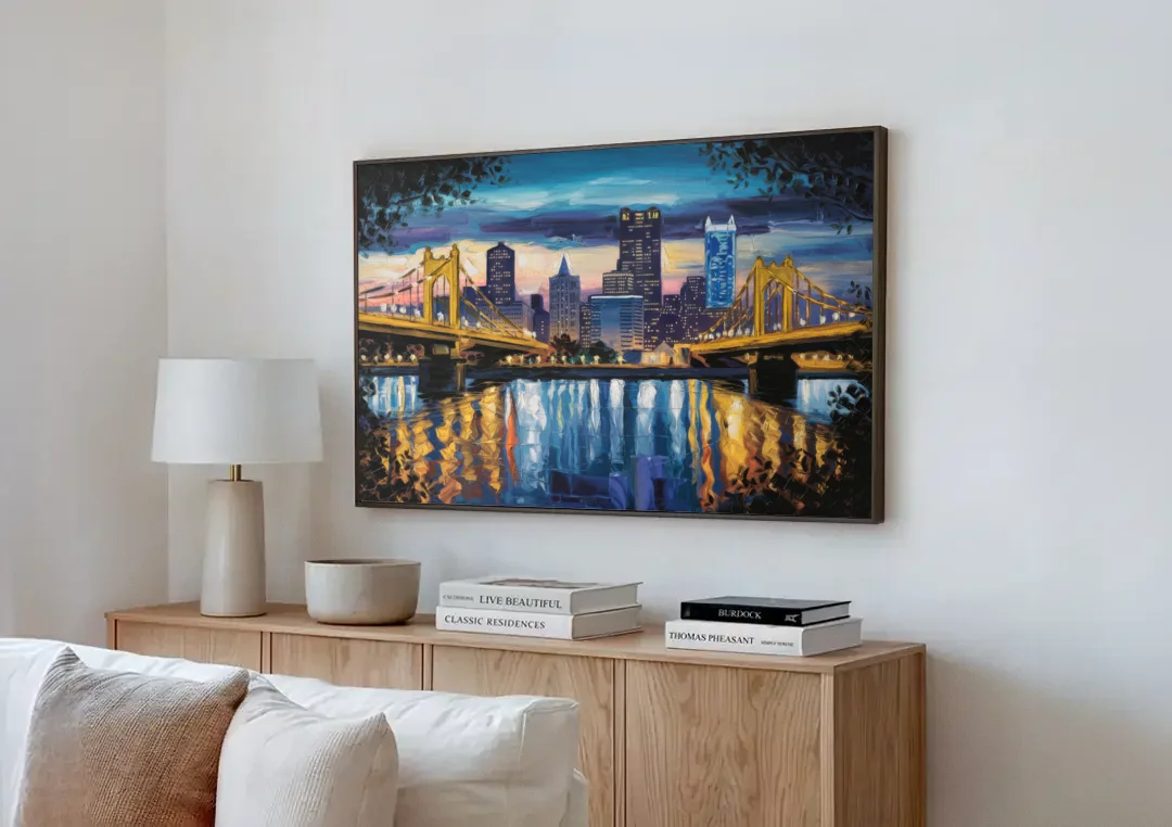 Pittsburgh Downtown Lights at Night canvas wall art above a wooden sideboard next to a sofa