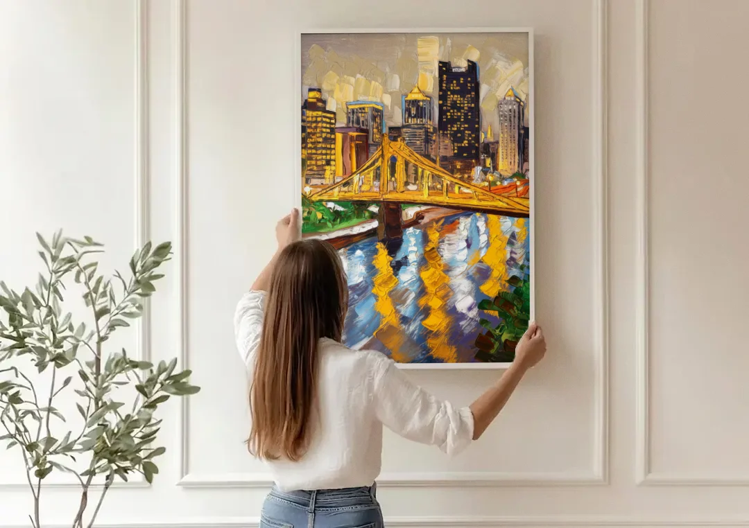 Pittsburgh Downtown Lights canvas wall art being hung on a paneled wall
