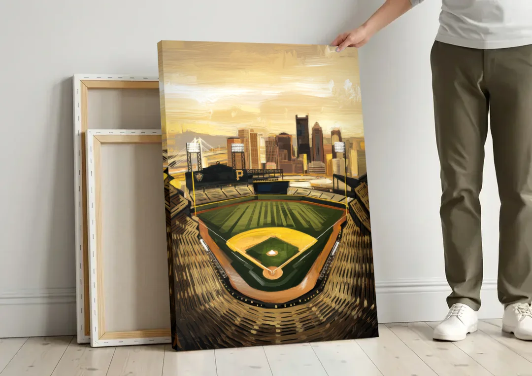 Pittsburgh Pirates Heritage canvas wall art leaning against a wall next to blank canvases