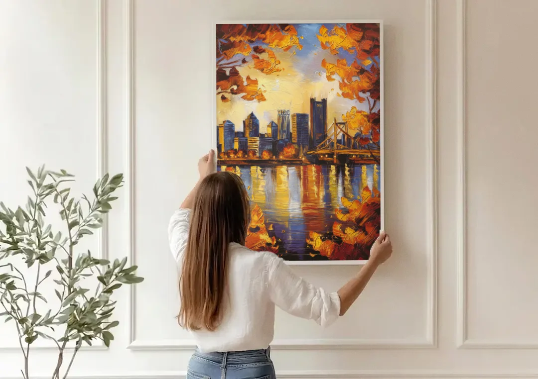 Pittsburgh Skyline in Autumn canvas wall art being hung on a paneled wall