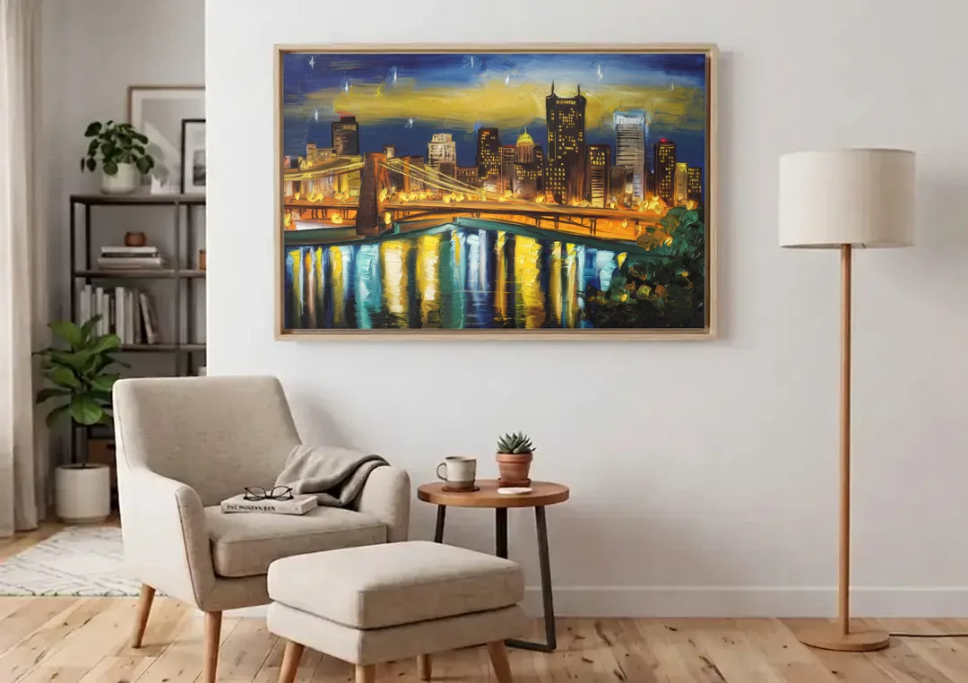 Pittsburgh Skyline With Rivers canvas wall art above an armchair in a bright living room