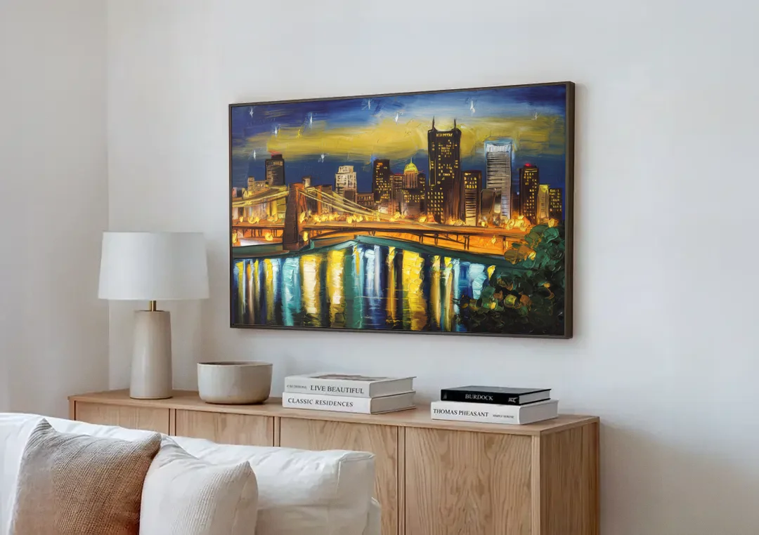 Pittsburgh Skyline With Rivers canvas wall art above a wooden sideboard next to a sofa