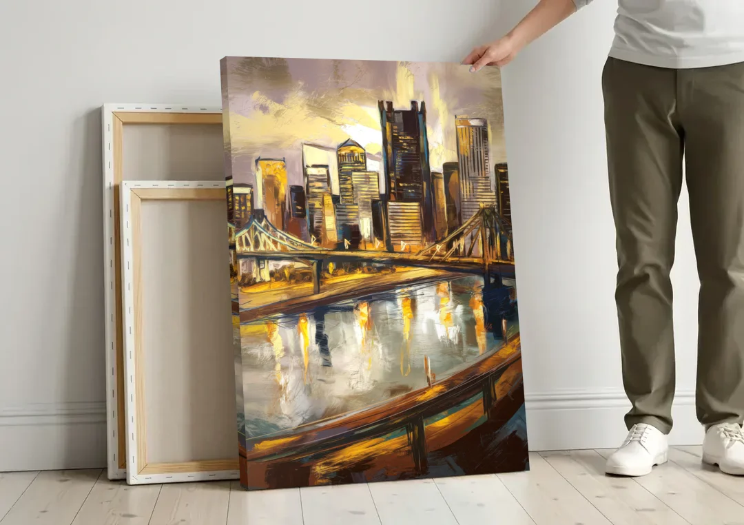 Pittsburgh Steel City Vibes canvas wall art leaning against a wall next to blank canvases