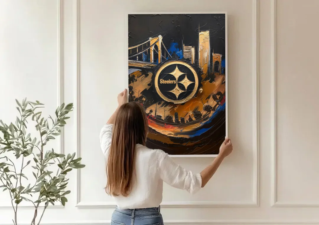 Pittsburgh Steelers Fan Pride canvas wall art being hung on a paneled wall