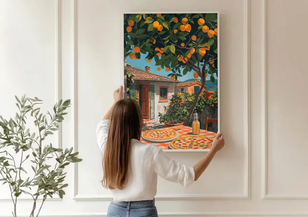 Pizza Painting Under an Orange Tree canvas wall art being hung on a paneled wall