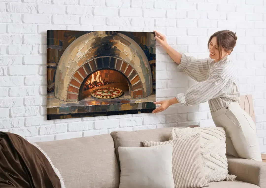 Pizza Restaurant Decor with a Brick Oven Glow canvas wall art being hung on a white brick wall above a sofa