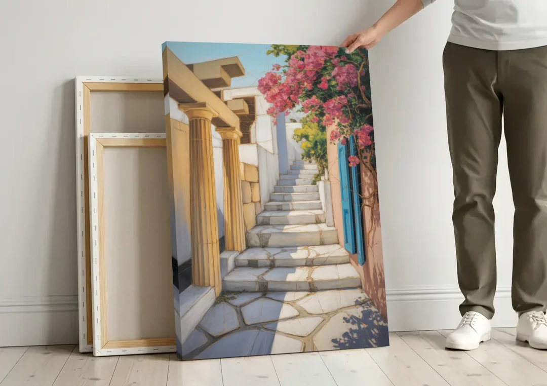 Plaka Pathways canvas wall art leaning against a wall next to blank canvases