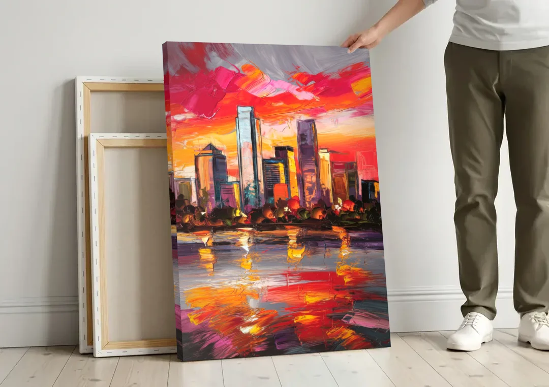 Plano Skyline Sunset canvas wall art leaning against a wall next to blank canvases