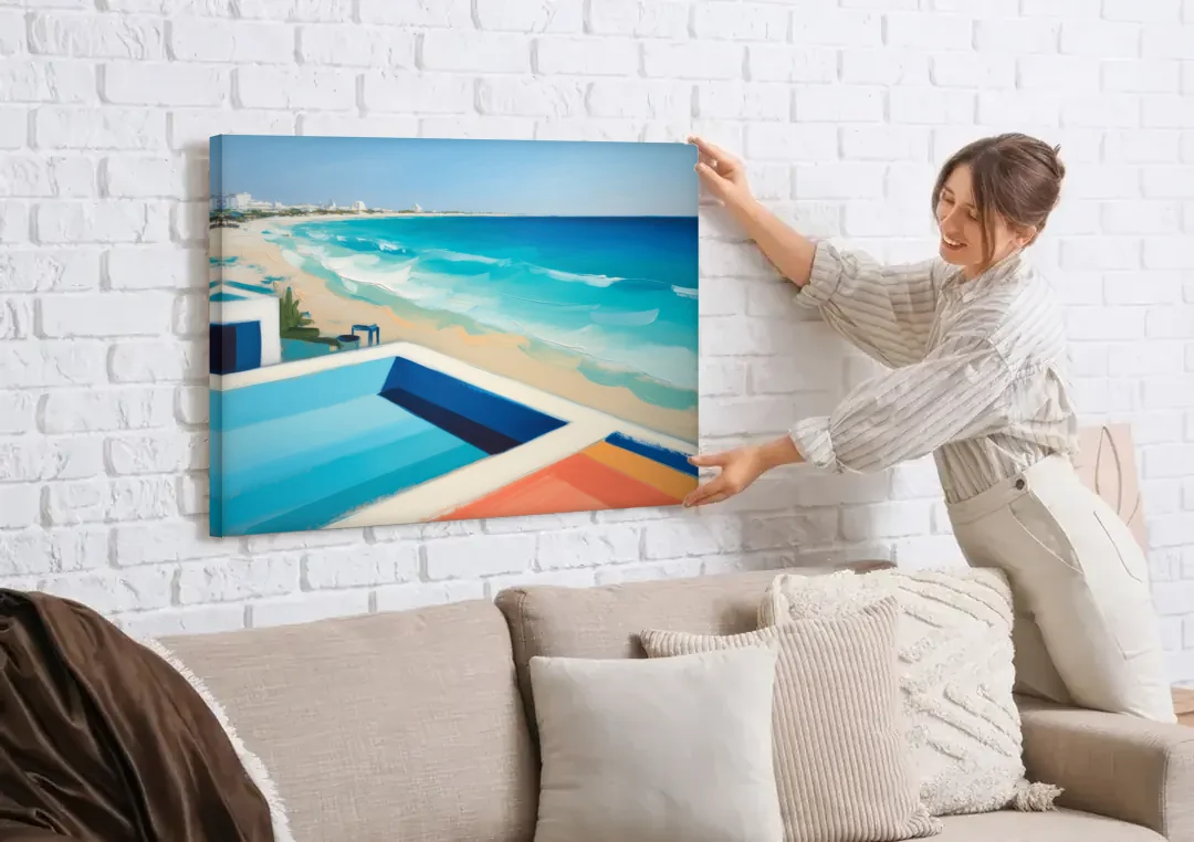 Playa del Carmen Beachfront canvas wall art being hung on a white brick wall above a sofa
