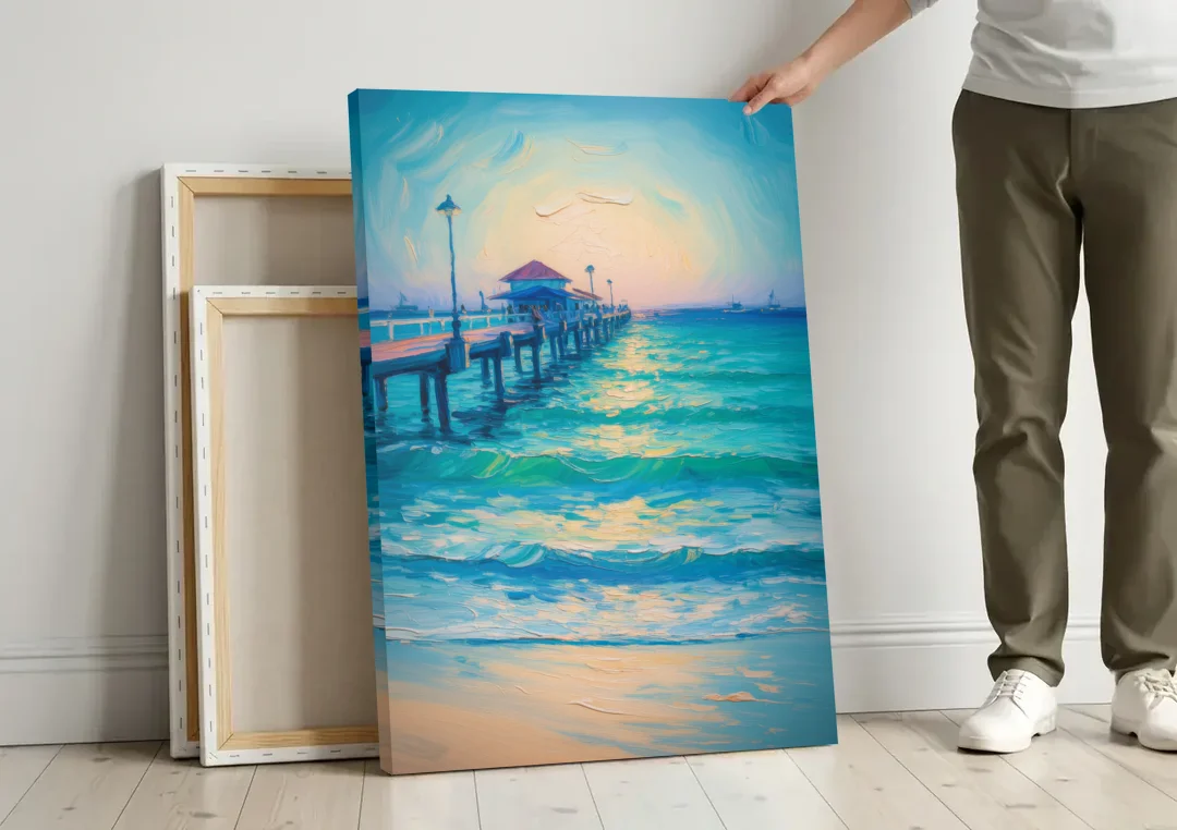Playa del Carmen Pier canvas wall art leaning against a wall next to blank canvases
