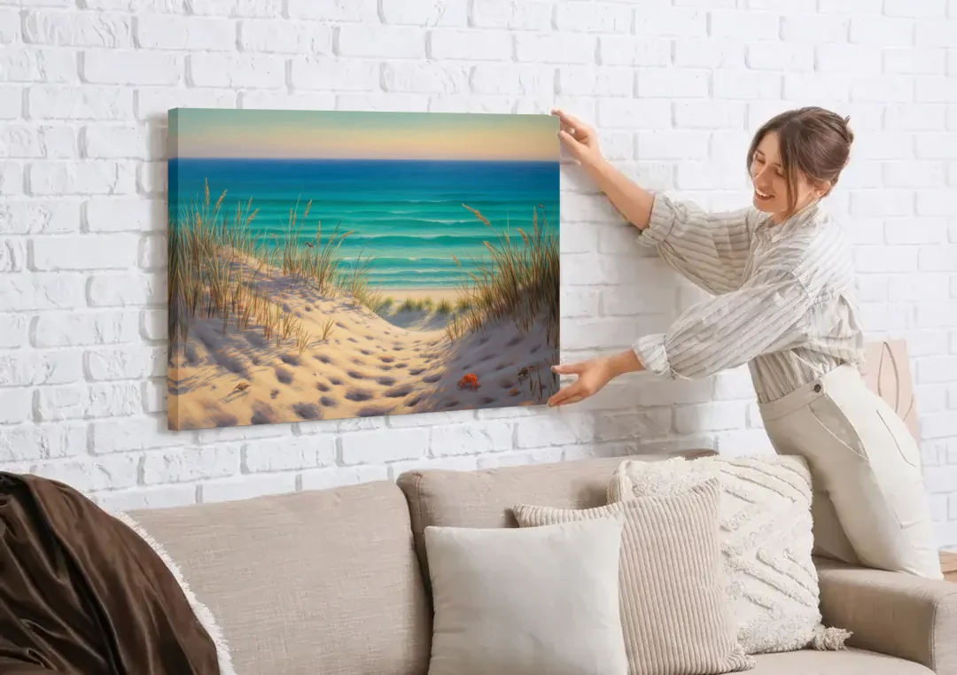 Playa Marlín Dunes canvas wall art being hung on a white brick wall above a sofa