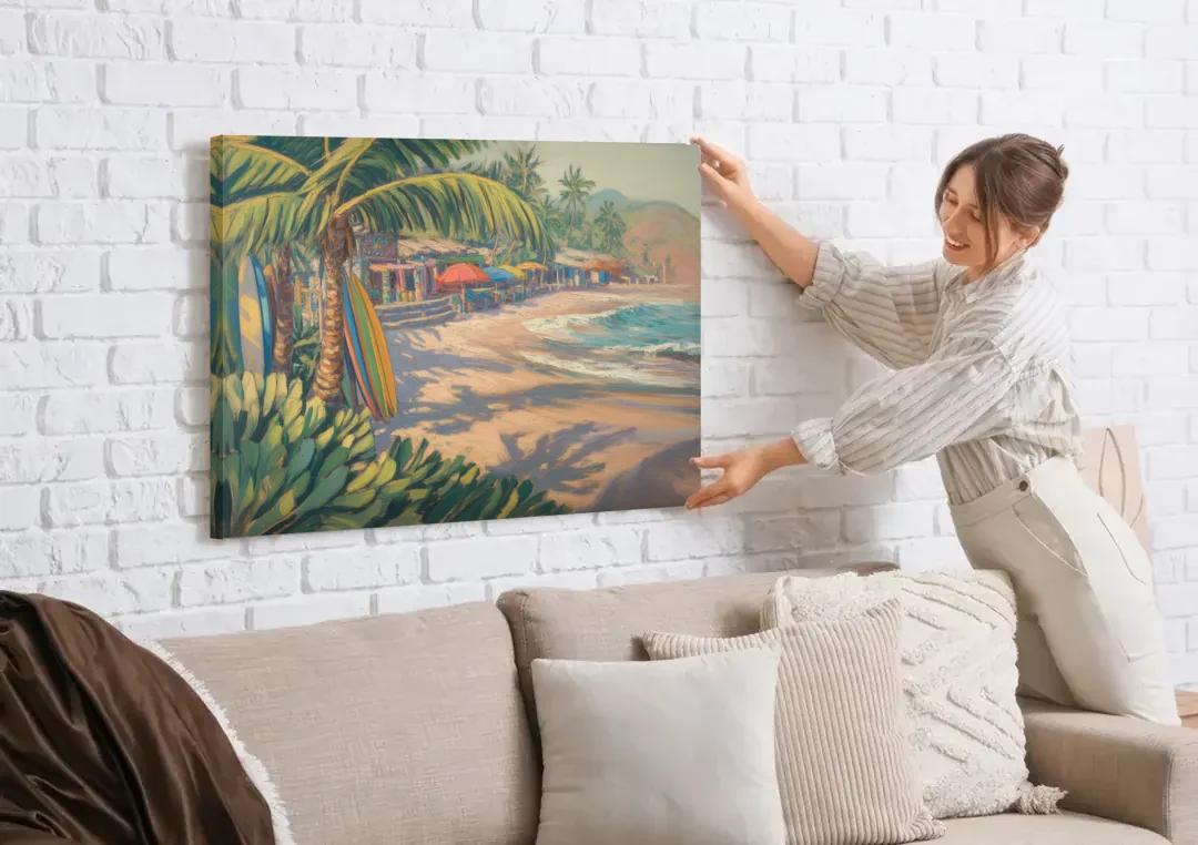 Playa Sayulita Palms canvas wall art being hung on a white brick wall above a sofa