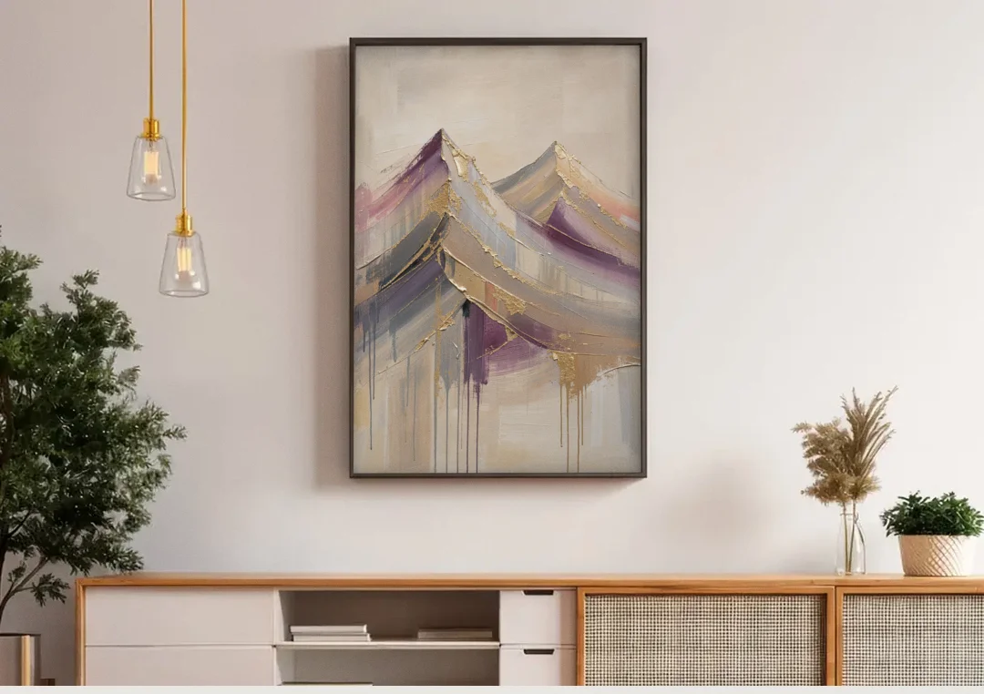 Abstract Plum and Gold Mountain Peaks canvas wall art above a wooden sideboard under pendant lights