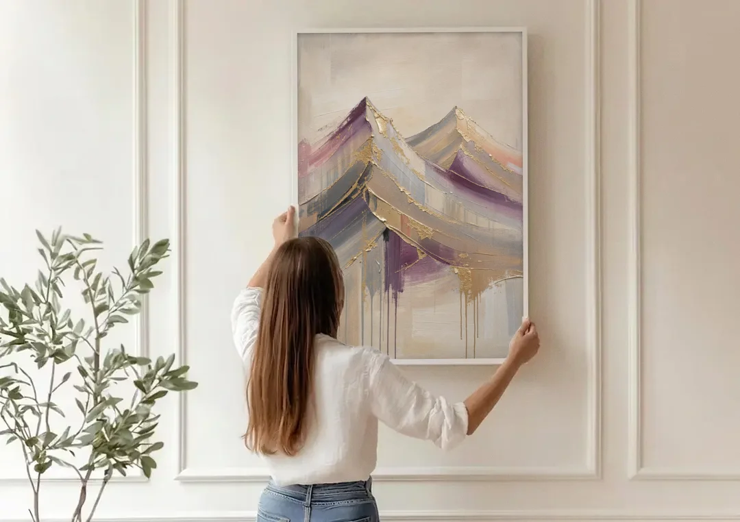 Abstract Plum and Gold Mountain Peaks canvas wall art being hung on a paneled wall
