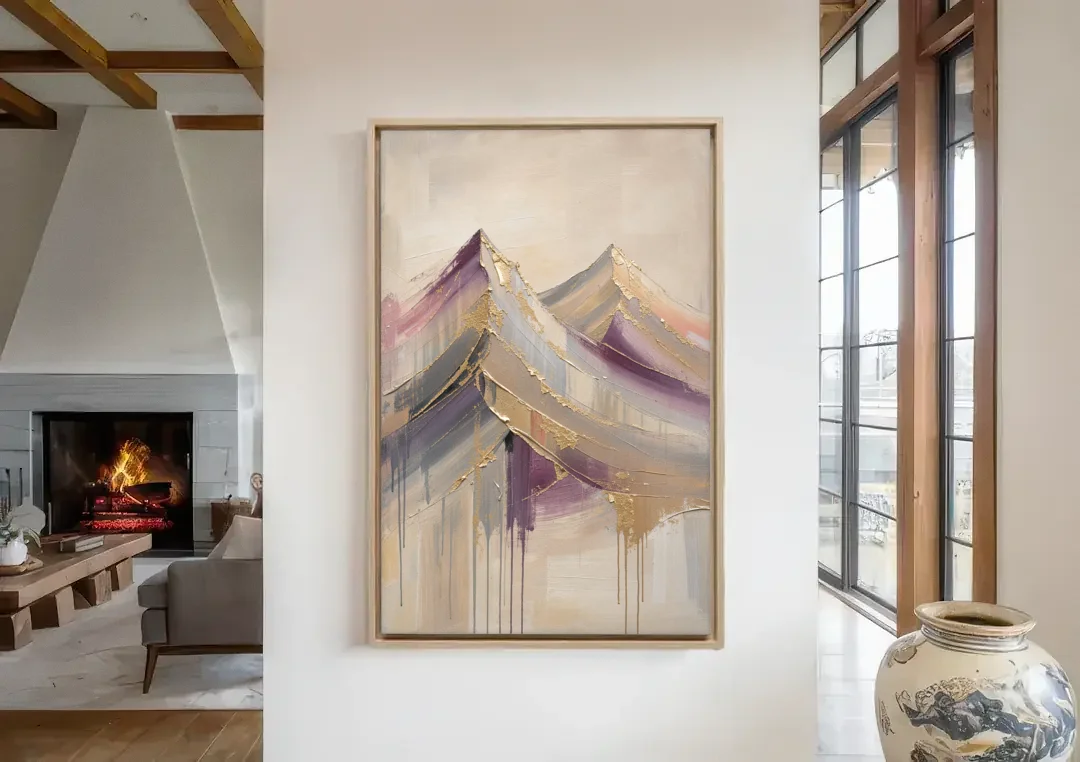 Abstract Plum and Gold Mountain Peaks canvas wall art in a living room with a fireplace