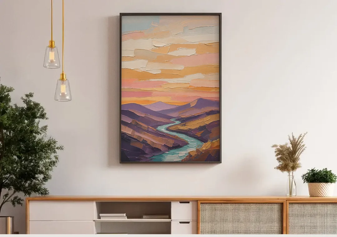Plum Hills and Teal River at Sunset canvas wall art above a wooden sideboard under pendant lights