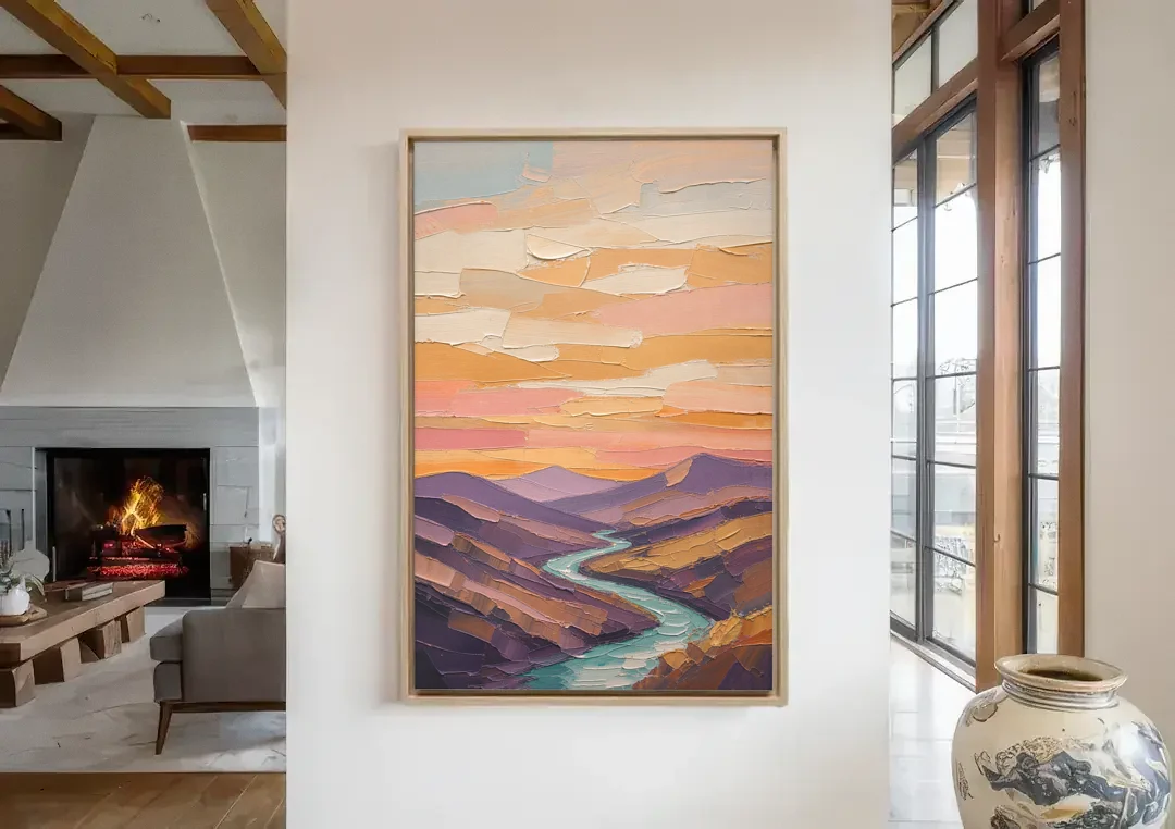 Plum Hills and Teal River at Sunset canvas wall art in a living room with a fireplace