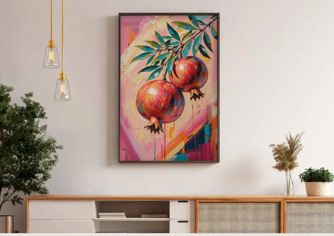 Pomegranate Painting with Two Fruits on Pink canvas wall art above a wooden sideboard under pendant lights