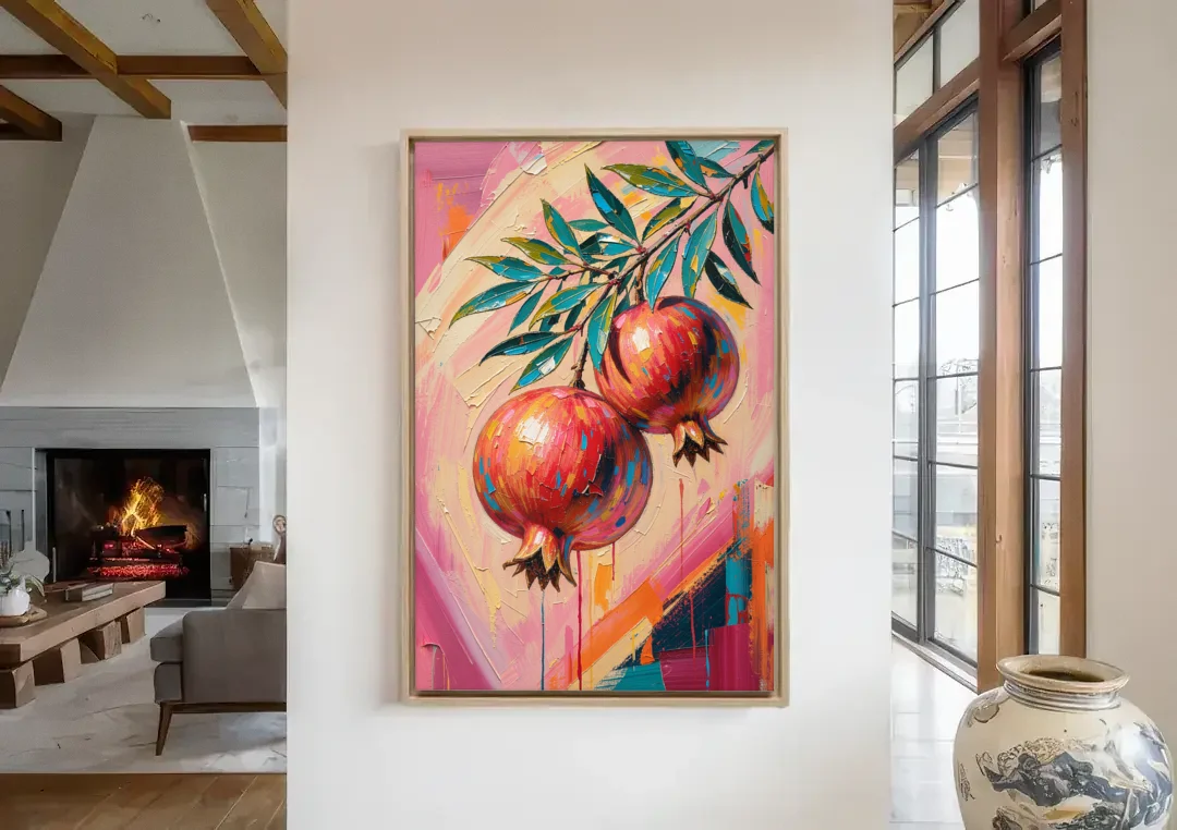 Pomegranate Painting with Two Fruits on Pink canvas wall art in a living room with a fireplace