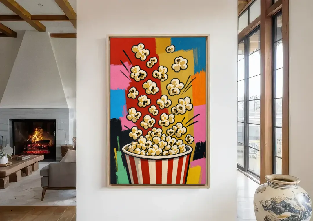 Popcorn Wall Art Bursting from a Striped Bucket canvas wall art in a living room with a fireplace