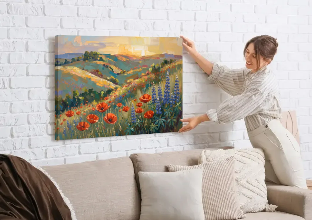 Poppy Field Painting with Lupines on Rolling Hills canvas wall art being hung on a white brick wall above a sofa